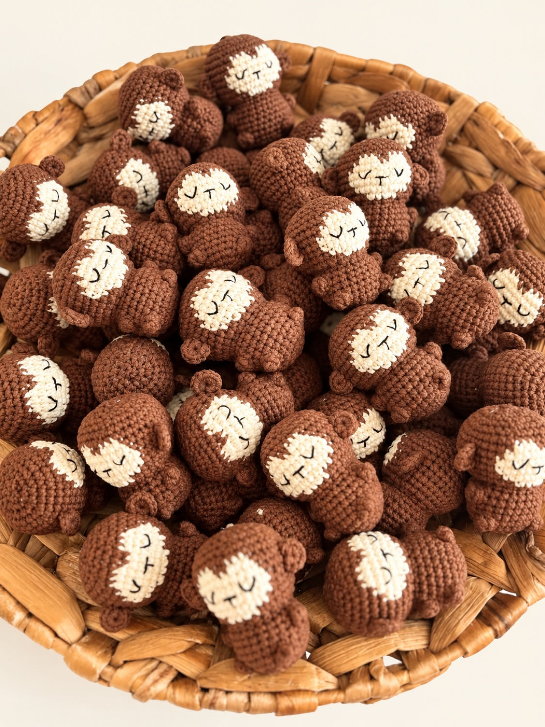 Brown monkey crochet minis in a basket