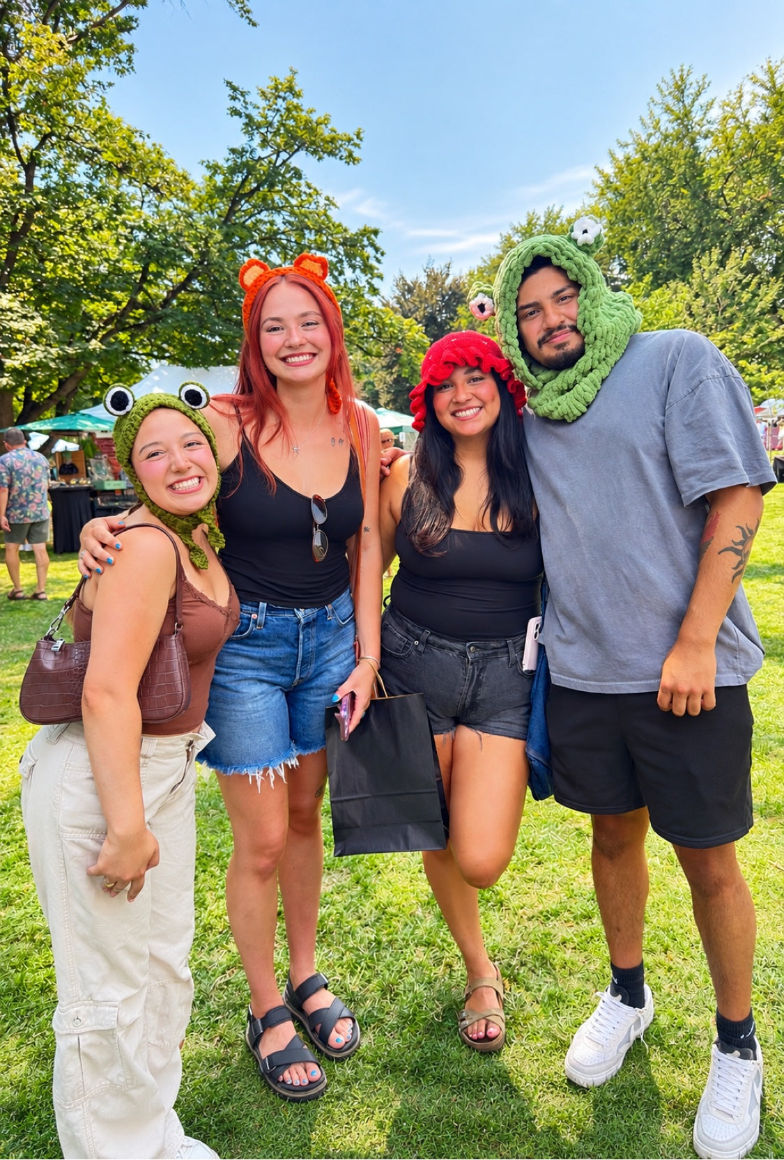 Frog Headband worn by a customer (left) with friends