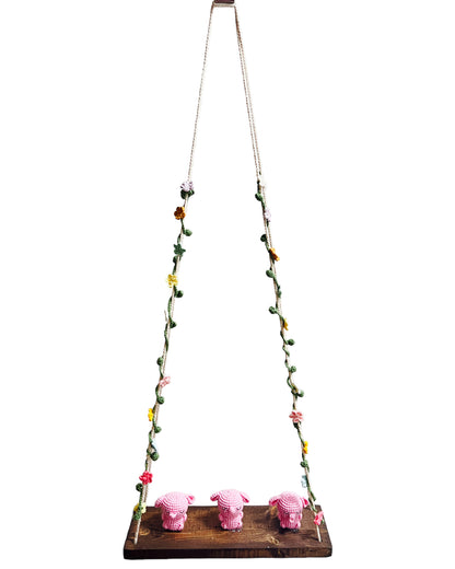 Pink bunny on a swing  Hanging Wall Shelf