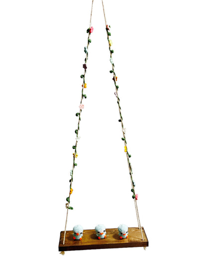 Blue Penguin on a swing  Hanging Wall Shelf