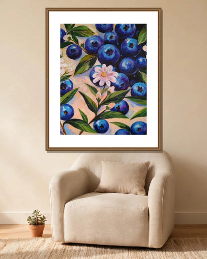 Blueberries & Blossom framed print styled in a cozy reading corner — frame not included