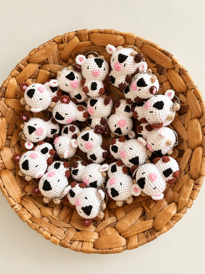 Cow crochet minis with keyrings in a basket