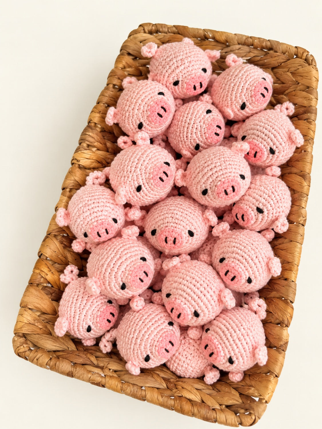 Pink pig crochet minis in a basket