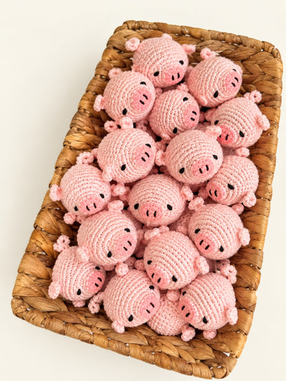 Pink pig crochet minis in a basket