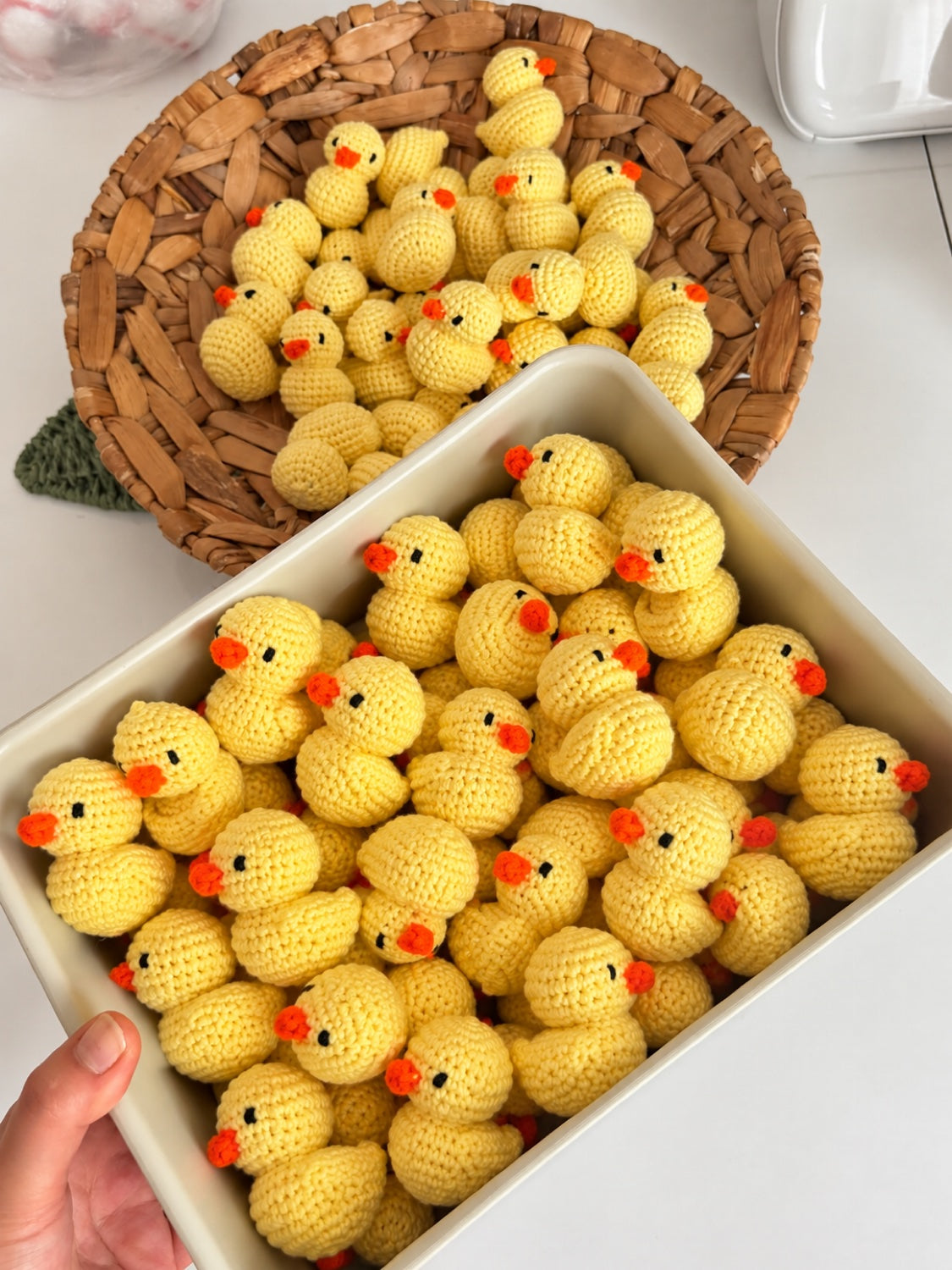 Yellow duck crochet minis in a tub