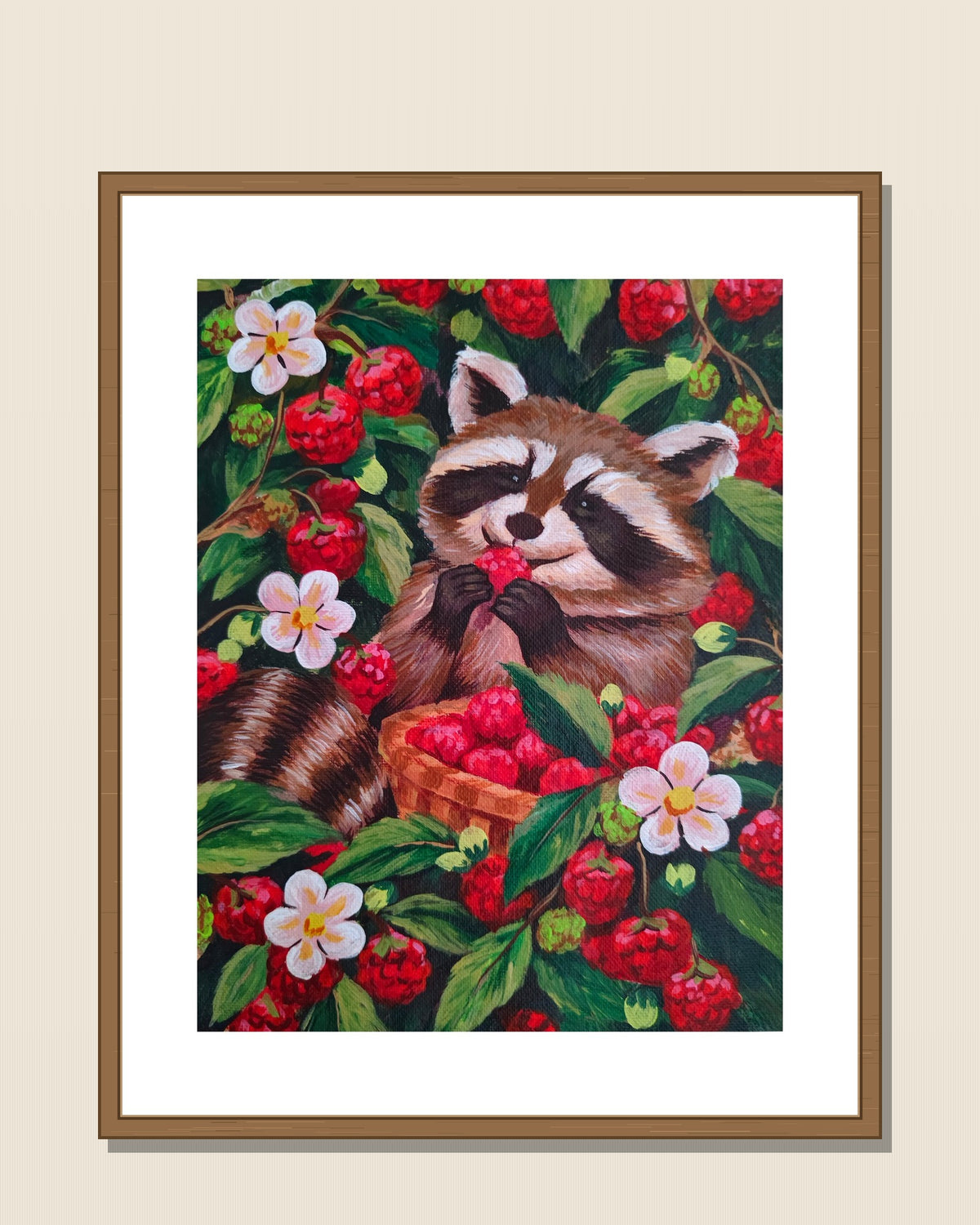 Raccoon & Raspberries shown in a natural wood frame for display inspiration — frame not included