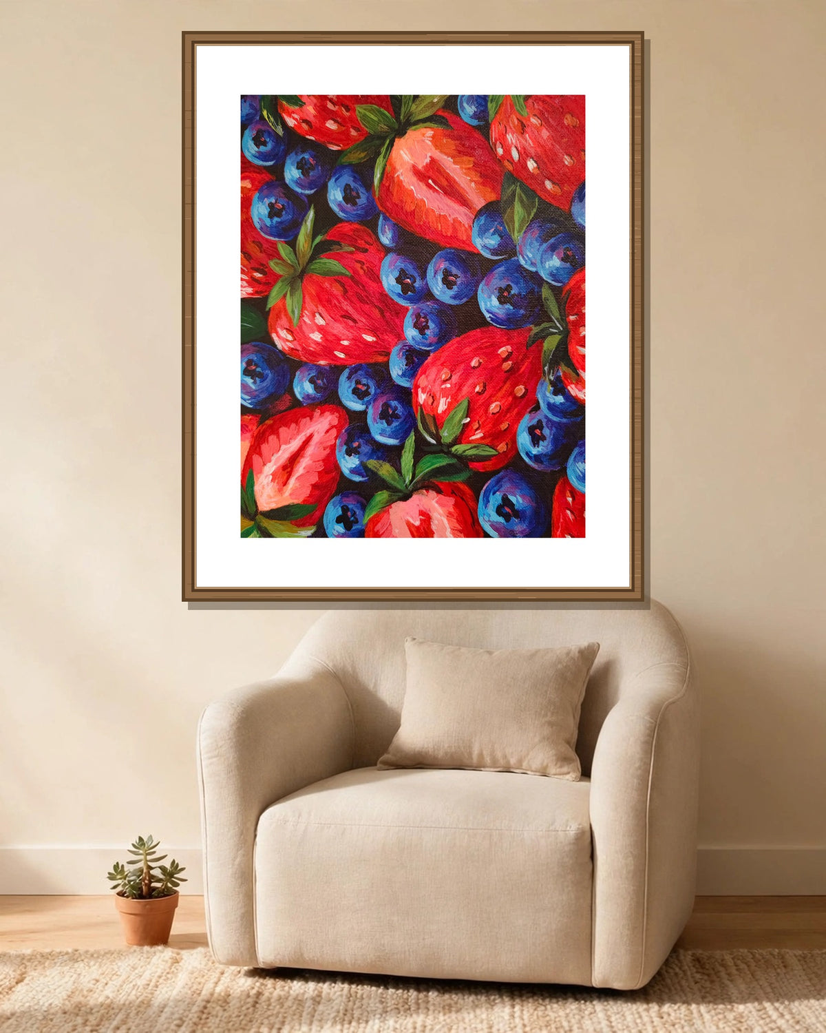 Strawberries & Blueberries framed print styled in a cozy reading corner — frame not included