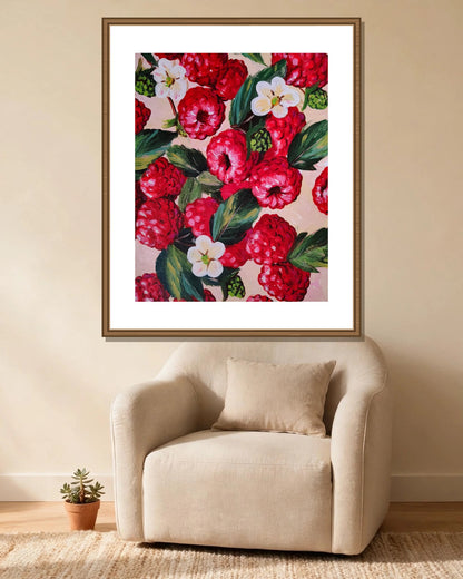 Wild Raspberries framed print styled in a cozy reading corner — frame not included